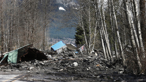 지난 22일 발생한 산사태로 인해 흙더미에 묻혀버린 워싱턴주 오소 인근의 주택